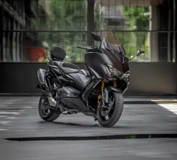 black sports bike on road during daytime