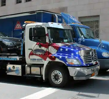 blue and white truck close-up photography