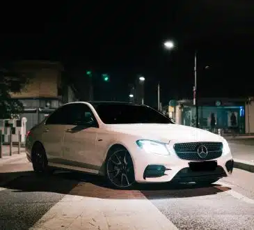 white mercedes benz coupe on road during night time